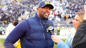 offensive coordinator Sherrone Moore ...