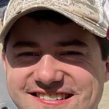 College Football Player's Gesture Toward Cheerleader Is Turning Heads