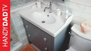 Ikea metod cabinets painted slate grey and used as a floating bathroom vanity. Ikea Vanity Hemnes Novocom Top