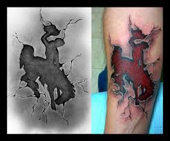 Officially licensed by the university of wyoming these steamboat pendants are a wonderful way to support your state or take a memorable piece of wyoming home with you. Wyoming Bucking Horse Logo Design Tattoo Tattoo Com