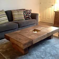This dark wood effect coffee table with khaki glass and chrome legs would make an excellent addition in any modern or contemporary home. Oak Coffee Table Dark Wood Coffee Table Coffee Table Sleeper Coffee Table Sleeper Table Sleeper Coffee Table In 2021 Dark Wood Coffee Table Wood Table Living Room Coffee Table Wood