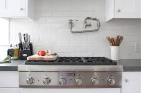 Do people still install pot fillers? Kitchen Tour Josh Maria S Pristine Renovation Pot Filler Faucet Pot Filler Kitchen Remodel