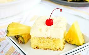 Moist and flavorful pineapple cake layers are filled a coconut cream cheese filling topped with pineapple, and frosted in coconut cream cheese frosting covered in more coconut! Pineapple Sunshine Cake Love Bakes Good Cakes