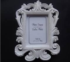 Whether you're looking for unique home decor or selling professional framed prints to your photography clients, our new modern frames are perfect for showing off family, travel, wedding, engagement, or newborn photos. 2021 Resin White Baroque Photo Frame Wedding Place Card Holder Picture Frames From Dhgate Factoryseller 1 12 Dhgate Com