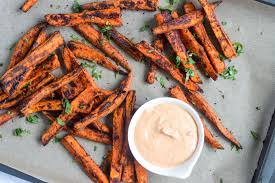 Remember that these air fryer sweet potato fries will shrink after cooking, so look for a shape slightly longer than the ideal fry length. Crispy Sweet Potato Fries With Vegan Queso Cheesy Dip