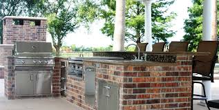 The brick wall is the style statement of the kitchen. Brick Barbeque Veneer Landscaping Network