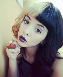 Blonde highlights add an unusual dimension to black hair. Melanie Martinez S Hairstyles Hair Colors Steal Her Style Page 5