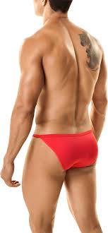 PPU thongs in orange color, showcasing a impressive package.