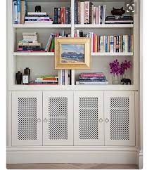 Simpli home acadian solid wood medium storage cabinet with round door pulls in white. White Bookshelf With Doors Ideas On Foter