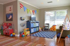 Playrooms are meant to be fun, and these kids playroom ideas deliver loads of it. Kids Playroom Ideas Traditional Kids Colour Schemes Dallas Blue Bookcase Bright Children Colors Geometri Playroom Flooring Playroom Paint Colors Playroom Paint