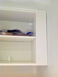 In many cases, the cabinet manufacturers offer filler strips to ensure the wood type and finish are a perfect match for the cabinets. Making Ikea Cabinets Look Expensive Hint Use Diy Ikea Pax Filler Panels Rambling Renovators