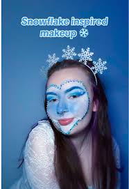 feeling frosty ❄️✨ love love loved creating this snowflake inspired makeup  look for @Human Beauty LDN’s #12DaysOfHBmas campaign ❄️🩵 [Video  description: Trina is a white woman with brown hair. She ...