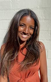 The Satchel and the Pink Wig