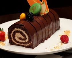 Buche De Noel Aux Carambars Recipe Sweets Recipes Chocolate Roll Cake Yummy Cakes