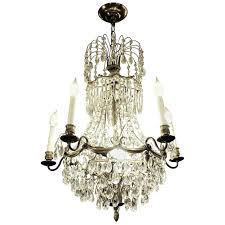 This product must be shipped freight and may require some assembly on arrival. 1920s Empire Style 10 Light Crystal And Brass Basket Chandelier For Sale At 1stdibs