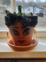 Cute cactus with a face drawn by a child