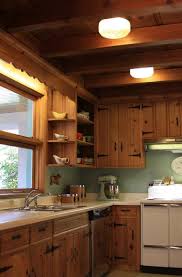 A Knotty Pine Kitchen Respectfully Retained And Revived Pine Kitchen Cabinets Knotty Pine Kitchen Kitchen Renovation
