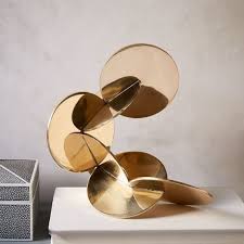 Enjoy free shipping on most stuff, even create a decorative wall display or hang them throughout your home as separate pieces for a cohesive decor theme. Get The Look For Less Mid Century Modern Modern Decorative Objects Sculpture Decorative Objects