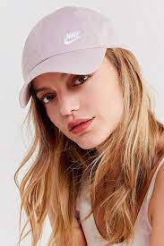 Nike S Soft Pink Dad Hat Is A Spring Must Have Baseball Hats Nike Hat Women Outfits With Hats