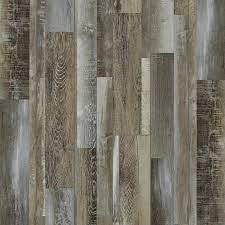 Vinyl plank flooring is offered in hundreds of colors and patterns from the major flooring manufacturers. Smartcore Monroe Oak Wide Thick Waterproof Interlocking Luxury 18 35 Sq Ft In The Vinyl Plank Department At Lowes Com