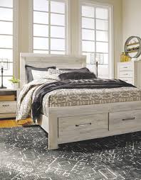 This platform bed is made of poplar and walnut and sits atop a finely finished metal base. Bellaby Queen Platform Bed With 2 Storage Drawers B331b4 B10013 54s 57 95 Complete Beds Pruitt S Fine Furniture