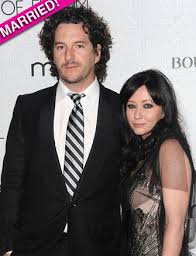 The bride wore monique lhuillier and walked down the aisle at sunset in front of 100 of the couple's closest friends and family. Shannen Doherty Weds For The Third Time