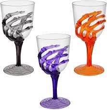 Adding a few cubes of dry ice will give it that ever so creepy fog effect. Amazon Com Halloween Skeleton Hand Plastic Goblets Champagne Flutes Stemless Cups Perfect For Creepy Spooky Halloween Decorations And Haunted House Choose Set Of 3 Each Goblets Set Of 3 Champagne Glasses