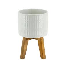 This beautiful stand for plants is great to keep smaller potted plants in, and super great for display outdoors (though the simplistic wooden design means it goes well indoors as well). Ceramic Roman Planter With Wood Stand Green Fresh Florals Green Fresh Florals Plants