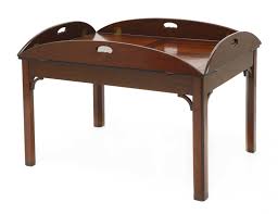 Industrial round butler tray table is the perfect handy piece of furniture which offers 3 tiers of shelves which can be used for storing any kitchen essentials like cutlery, food or any bits and pieces you need to keep at hand. Lot 103 A Modern Mahogany Butler S Tray Coffee Table