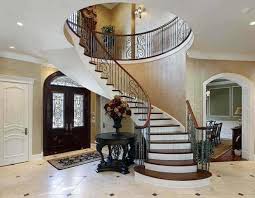 A stairway which is fully enclosed by walls and routed stringers on both sides. Interior Trim Elegant Staircases Entryways Home Tips For Women