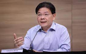 A member of the governing people's action party, he currently serves as the minister f. Lawrence Wong Hints At Possible Delay In Phase 3 Reopening