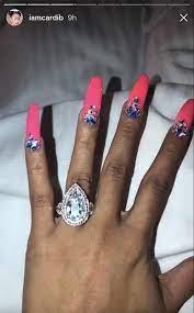 Cardi B S Engagement Ring Custom By Pristine Jewelers 8ct Raindrop Shape Diamond With Pink Diamond Halo Nail Art Designs Videos Christmas Nails Winter Nails
