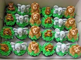 .from the sweet and simplistic dessert table to the tropical blooms and decor, this celebration is one to adore! Safari Cupcakes For Baby Shower Online