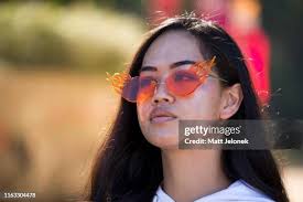 Adrian Man wears Sunglasses by Rayban, Shirt by Golf le Fleur by... News  Photo