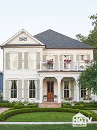 A Neutral Colored Home With Sage Green Shutters From Hgtv Magazine In 2020 Green Shutters New Orleans Homes Exterior House Colors