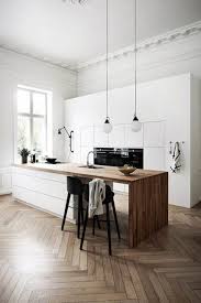 White walls, cabinets, and a kitchen island in the space are broken up by a beautiful ocean blue accent wall in the back of the kitchen. Contemporary Kitchen Design Ideas Modern Kuche Kolumbus Von Everingham Design Houzz