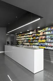 Gallery Of Campos Pharmacy E 348 Arquitectura 26 Pharmacy Design Pharmacy Decor Store Design Interior