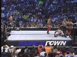 Chris Benoit & Eddie Guerrero vs The Rock & Edge