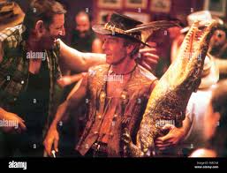 RELEASE DATE: April 30, 1986. MOVIE TITLE: Crocodile Dundee. STUDIO:  Paramount Pictures. PLOT: New York reporter Sue travels to Australia to  meet and interview Michael J Crocodile Dundee, a man who runs