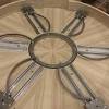 Expandable round table is a decline of the old wooden table stretcher. 1