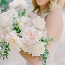 The lush form and delicate petals of peonies make them a timeless choice for both summer and winter weddings. 40 Perfect Peony Wedding Bouquets