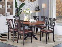 Unlike a long and narrow table, the circular shape makes it easy to squeeze in another chair without excluding anyone from the conversation. Buy East West Furniture Dinette Table Set 6 Great Wooden Dining Chairs A Beautiful Round Dining Table Faux Leather Seat Cherry And Black Finnish Butterfly Leaf Round Wooden Dining Table Online