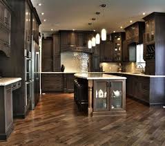 The white cabinets, walls, and subway tile backsplash keep the room feeling bright and open while the wood floor warms up the atmosphere with reflected this gorgeous contemporary kitchen utilizes dark granite counter tops and wood flooring to break up the use of bright white. Hardwood Floor And Kitchen Cabinet Combinations Shefalitayal