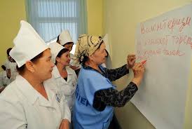A Community Volunteer Trainer Provides Lessons To Health Care Workers On How They Can Use Non Formal Health E Community Volunteering Health Education Volunteer