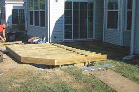 angled corner ground level deck outdoor decor backyard