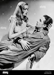 Original film title: THIS GUN FOR HIRE. English title: THIS GUN FOR HIRE.  Year: 1942. Director: FRANK TUTTLE. Stars: ALAN LADD; VERONICA LAKE.  Credit: PARAMOUNT PICTURES / Album Stock Photo - Alamy