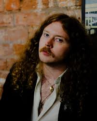 new headshots for brum's grumpiest sweetheart @bradleytaylorpoet ✨ 📸:  @pericimen his debut collection 'you missed the best part' will be  published april 2025