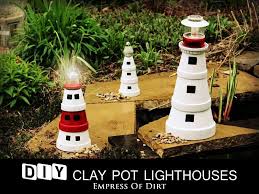By affixing the bucket firmly to this base, and adding a long handle to make it easier to move, you can create a dolly that will be useful in a range of situations. 23 Garden Lighthouse Ideas Lighthouse Garden Lighthouse Lighthouse Crafts