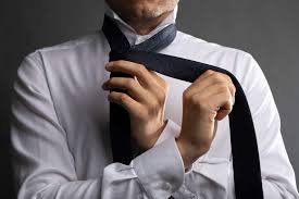 Wrap the wide end around the narrow end. How To Tie A Simple Tie Knot A K A Oriental Knot The Modest Man