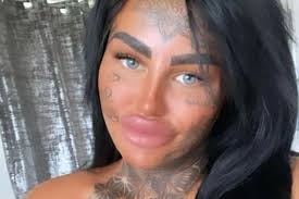 Woman dubbed 'Temu Katie Price' hits back at trolls after extreme filler  and face tattoos